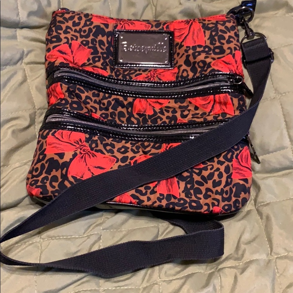 Betsy Johnson leopard and red bow crossbody bag